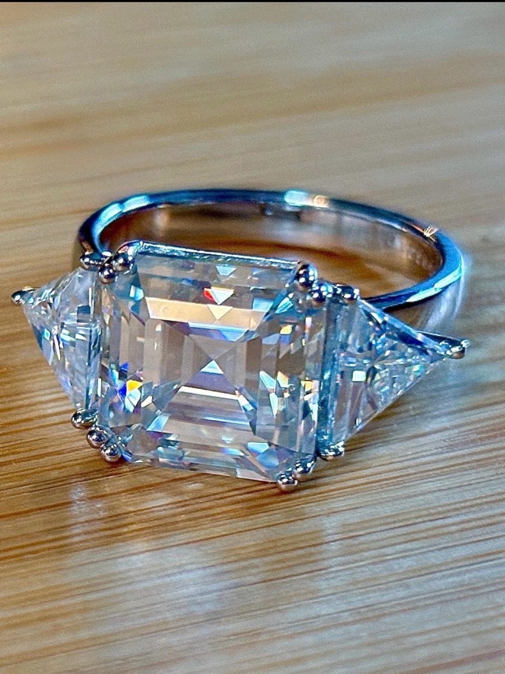 A 9.4ctw Moissanite Asscher-cut and triangle statement ring in sterling and 18k!